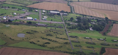 Aerial view of the former RAF Faldingworth showing some of the fissile material storage buildings to the lower right. Aerial view of the former RAF Faldingworth showing some of the fissile material storage buildings to the lower right.
